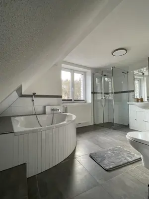 Ein Badezimmer in der Unterkunft Kaffeevollautomat, Hängematte & Netflix, zentral