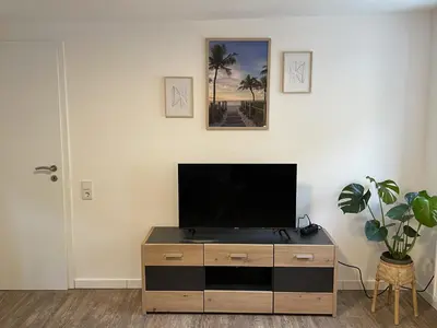 TV/Unterhaltungsangebot in der Unterkunft Kaffeevollautomat, Hängematte & Netflix, zentral