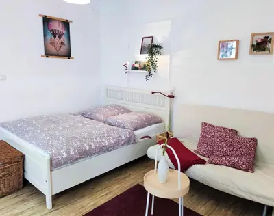 Ein Bett oder Betten in einem Zimmer der Unterkunft gemütliches Apartment mit Garten I Parkplatz I 10 Min zur Altstadt