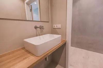 Ein Badezimmer in der Unterkunft STEILLAGE - Design Moselsuiten mit Panoramablick und SPA