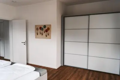 Ein Bett oder Betten in einem Zimmer der Unterkunft Weingut Meurer