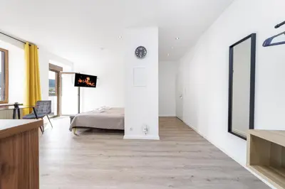 Ein Bett oder Betten in einem Zimmer der Unterkunft VonMos Moselblick Apartments