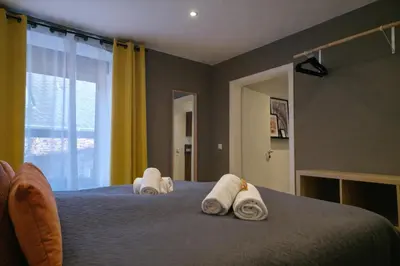 Ein Bett oder Betten in einem Zimmer der Unterkunft VonMos Moselblick Apartments