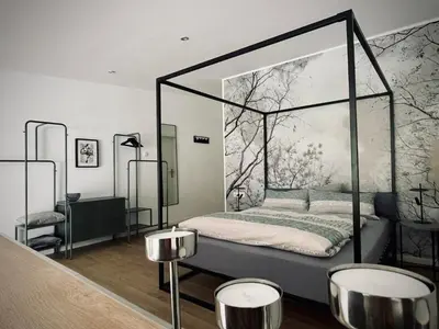 Ein Bett oder Betten in einem Zimmer der Unterkunft Weinlofts an der Mosel mit E10 Ladestation