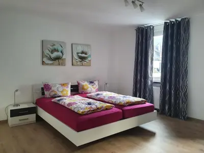 Ein Bett oder Betten in einem Zimmer der Unterkunft Ferienhaus Schnitzius