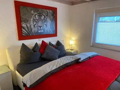 Ein Bett oder Betten in einem Zimmer der Unterkunft Moselchalet