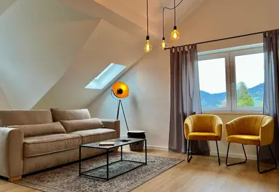Ein Sitzbereich in der Unterkunft VonMos Panorama Apartments