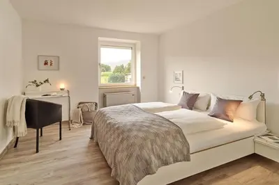 Ein Bett oder Betten in einem Zimmer der Unterkunft Ferienwohnung Hasport