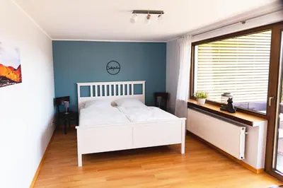 Ein Bett oder Betten in einem Zimmer der Unterkunft Ferienwohnung Moselmomente