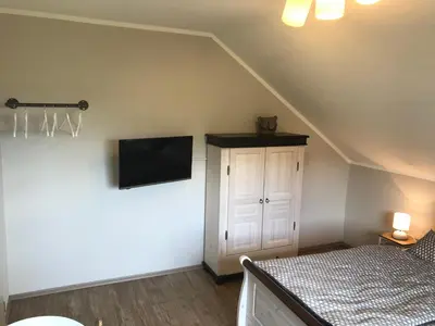 Ein Bett oder Betten in einem Zimmer der Unterkunft Landhaus Sonneninsel - Appartement