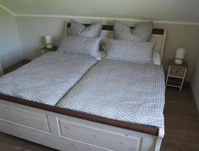 Ein Bett oder Betten in einem Zimmer der Unterkunft Landhaus Sonneninsel - Appartement