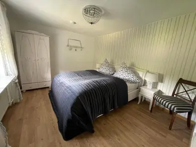 Ein Bett oder Betten in einem Zimmer der Unterkunft Villa Maaremonte