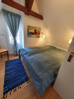 Ein Bett oder Betten in einem Zimmer der Unterkunft Am Burggraben auf der Sauerburg