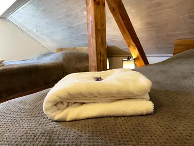 Ein Bett oder Betten in einem Zimmer der Unterkunft Gästehaus beim Metzger / Döttingen am Nürburgring