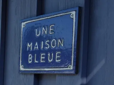 Ein Zertifikat, Auszeichnung, Logo oder anderes Dokument, das in der Unterkunft Blaues Haus - Une maison bleue ausgestellt ist