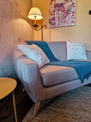Ein Sitzbereich in der Unterkunft Gutshaus De La Fontaine