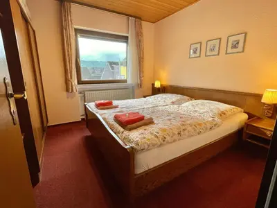 Ein Bett oder Betten in einem Zimmer der Unterkunft Apartment bei Stenze inklusive kostenlosem regionalem Nahverkehr