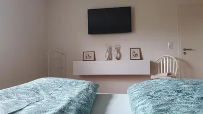 Ein Bett oder Betten in einem Zimmer der Unterkunft Ferienwohnung Pees