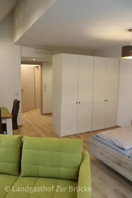 Ein Bett oder Betten in einem Zimmer der Unterkunft Aparthotel Layblick