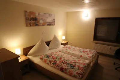 Ein Bett oder Betten in einem Zimmer der Unterkunft Ferienwohnung Mohrs