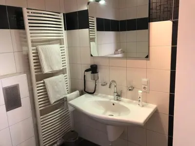 Ein Badezimmer in der Unterkunft Hotel Garni Rabennest