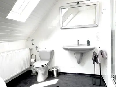 Ein Badezimmer in der Unterkunft Altes Winzerhaus am Moselufer - Klosterberg