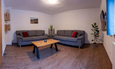 Ein Sitzbereich in der Unterkunft Fewo Thielke Fewo 1 Reichsburg