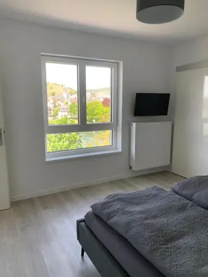 Ein Bett oder Betten in einem Zimmer der Unterkunft Moselflair