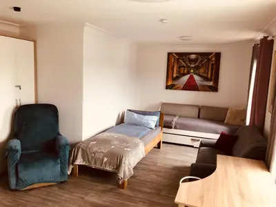 Ein Sitzbereich in der Unterkunft Monteurwohnung Fremdenzimmer mit WLAN, Garten, Parkplatz, eigener Terrasse