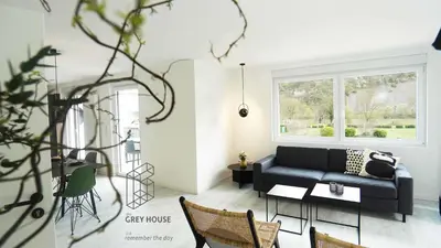 Ein Sitzbereich in der Unterkunft The Grey House