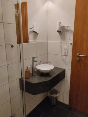Ein Badezimmer in der Unterkunft Hotel & Restaurant Brühler Hof