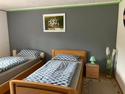 Ein Bett oder Betten in einem Zimmer der Unterkunft Ferienwohnung Le