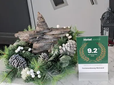 Ein Zertifikat, Auszeichnung, Logo oder anderes Dokument, das in der Unterkunft Ferienwohnung Weinand ausgestellt ist