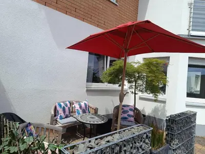 Ein Sitzbereich in der Unterkunft Ferienwohnung Weinand
