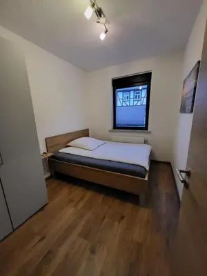 Ein Bett oder Betten in einem Zimmer der Unterkunft Ferienhaus Leo