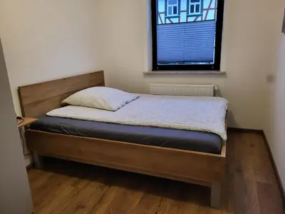 Ein Bett oder Betten in einem Zimmer der Unterkunft Ferienhaus Leo