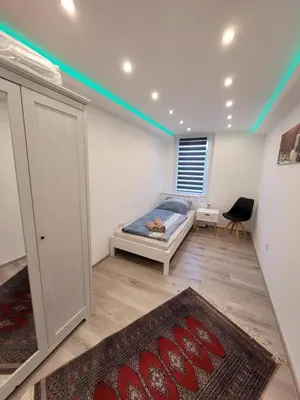 Ein Bett oder Betten in einem Zimmer der Unterkunft Ferienhaus Larina