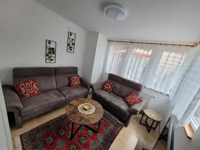 Ein Sitzbereich in der Unterkunft Ferienhaus Larina