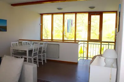 Ein Sitzbereich in der Unterkunft Ferienwohnung Altes Pfarrhaus mit Flair und Jufferblick