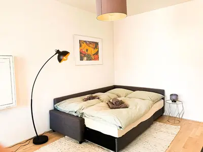 Ein Bett oder Betten in einem Zimmer der Unterkunft Home away from Home in a lovely vine region Bingen