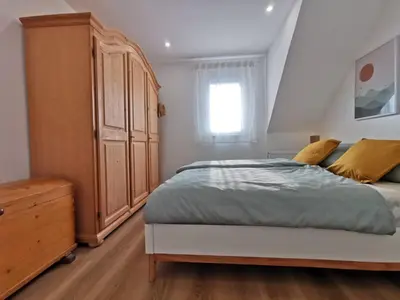 Ein Bett oder Betten in einem Zimmer der Unterkunft Ferienwohnung Koblenz Goldgrube
