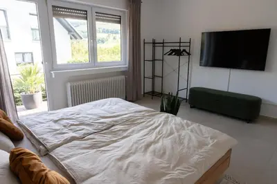 Ein Bett oder Betten in einem Zimmer der Unterkunft TRIMOSA - Apartments & Homes
