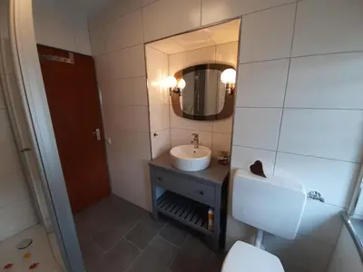 Ein Badezimmer in der Unterkunft Ferienhaus Zum Hochstein