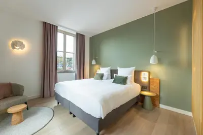 Ein Bett oder Betten in einem Zimmer der Unterkunft DEINHARD's