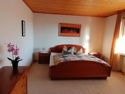 Ein Bett oder Betten in einem Zimmer der Unterkunft Ferienhaus Eifelmomente