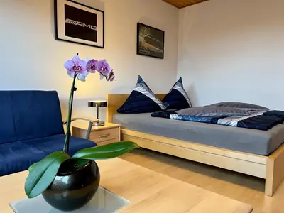 Ein Bett oder Betten in einem Zimmer der Unterkunft Ferienwohnung Terrasse Parkplatz WallBox Nürburgring
