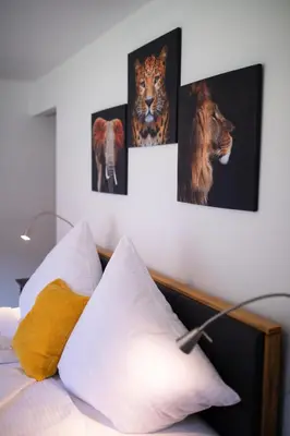 Ein Bett oder Betten in einem Zimmer der Unterkunft Rieslingresidenz