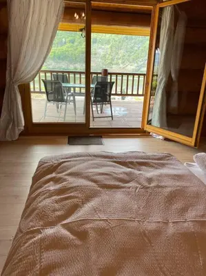 Ein Bett oder Betten in einem Zimmer der Unterkunft Traumhaftes Blockhaus am Rhein