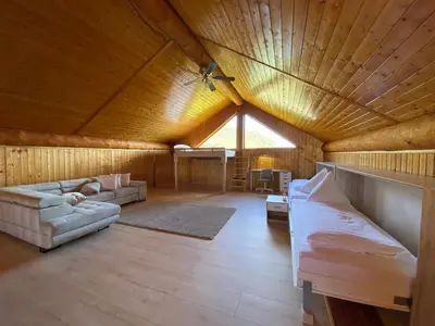 Ein Bett oder Betten in einem Zimmer der Unterkunft Traumhaftes Blockhaus am Rhein