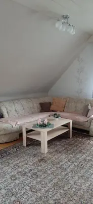 Ein Sitzbereich in der Unterkunft Ferienwohnung Gutowski
